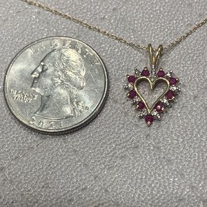 10k Pink Saphire and Diamond Stone Pendant Necklace.